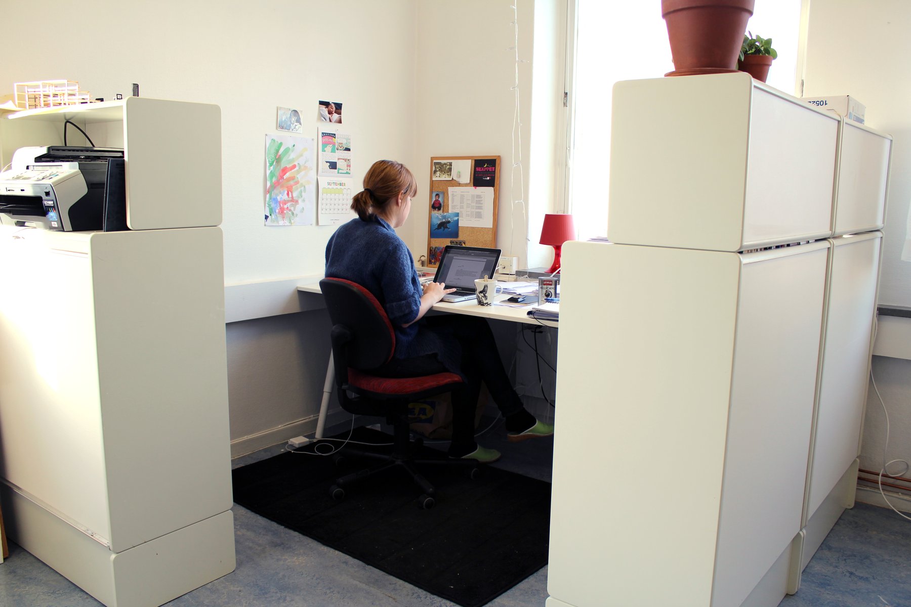 A member at a computer workstation in a Platform studio
